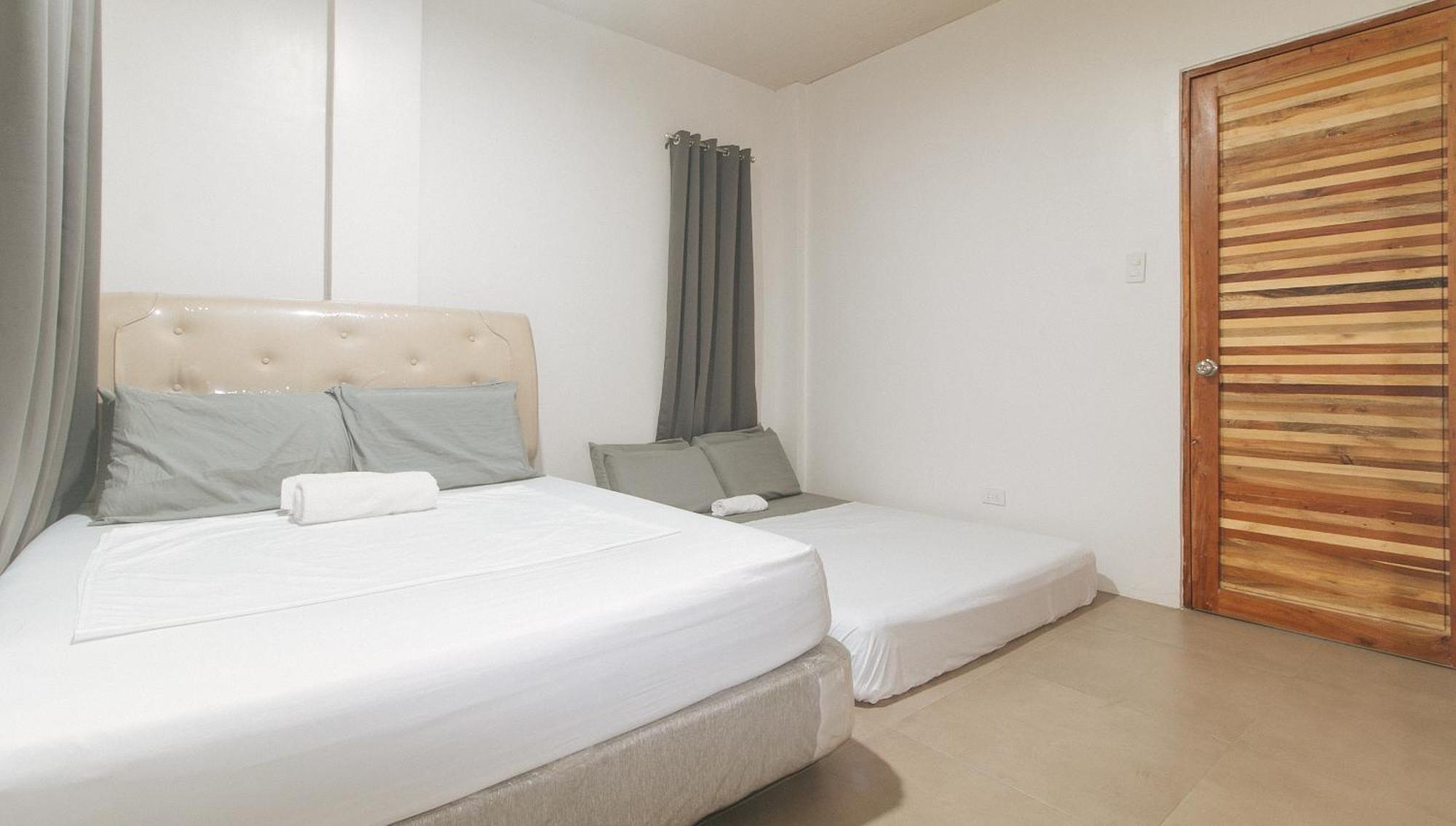 Cozy Cove Inn By Reddoorz Bacolod Buitenkant foto