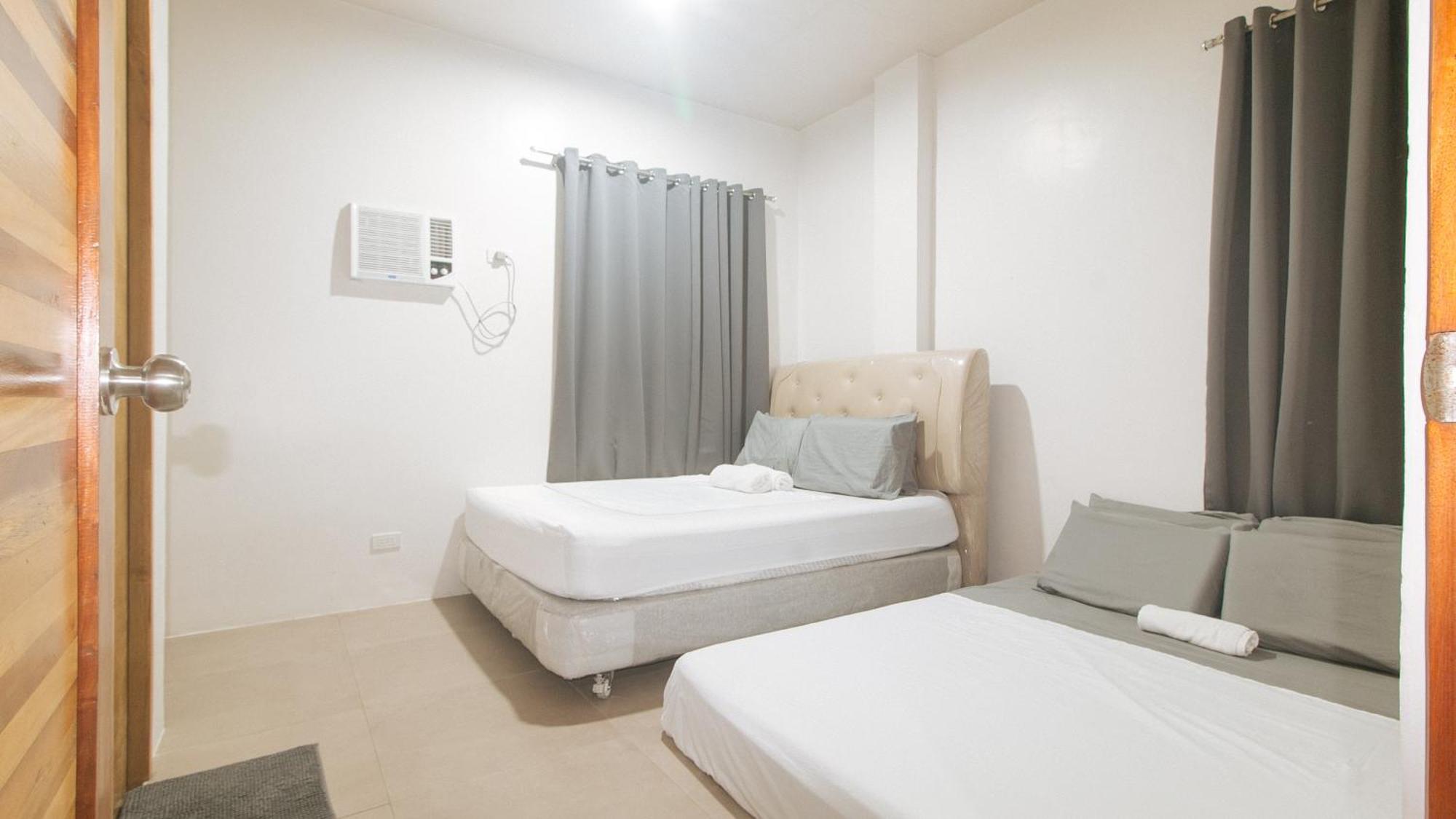 Cozy Cove Inn By Reddoorz Bacolod Buitenkant foto